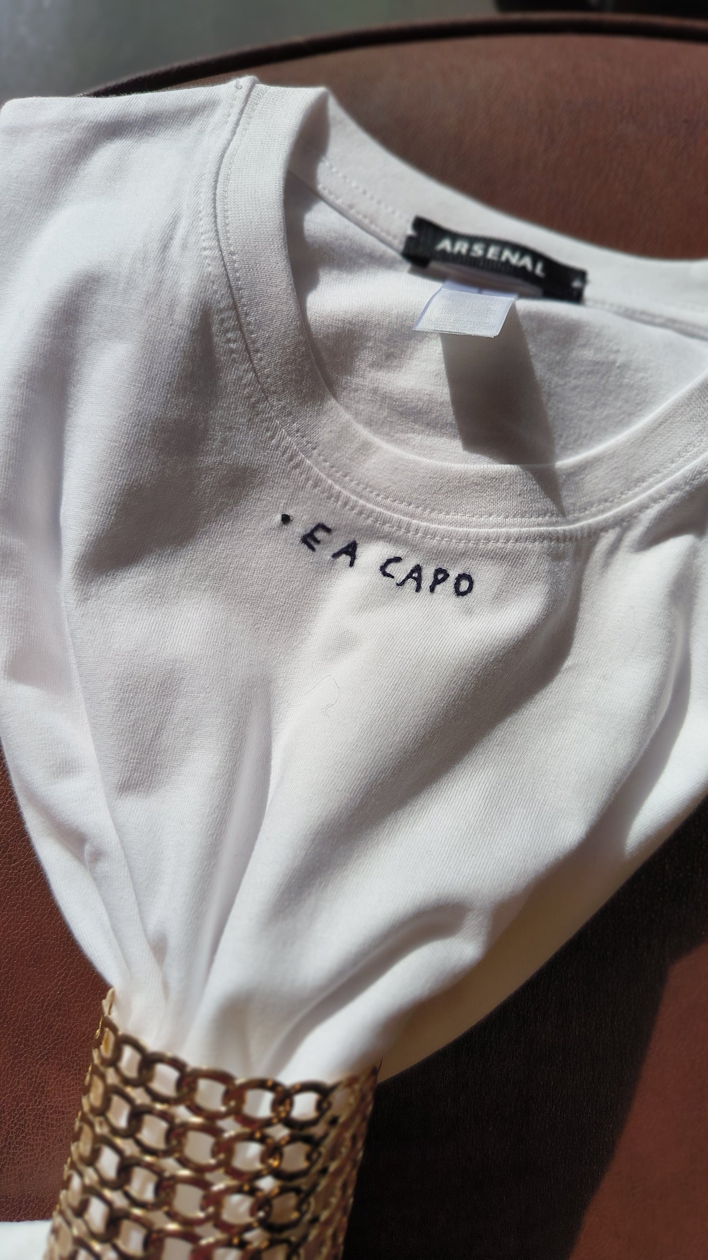 T-shirt  " . E A CAPO "